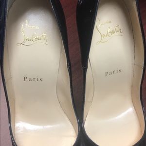 Christian Louboutin black pattened pumps